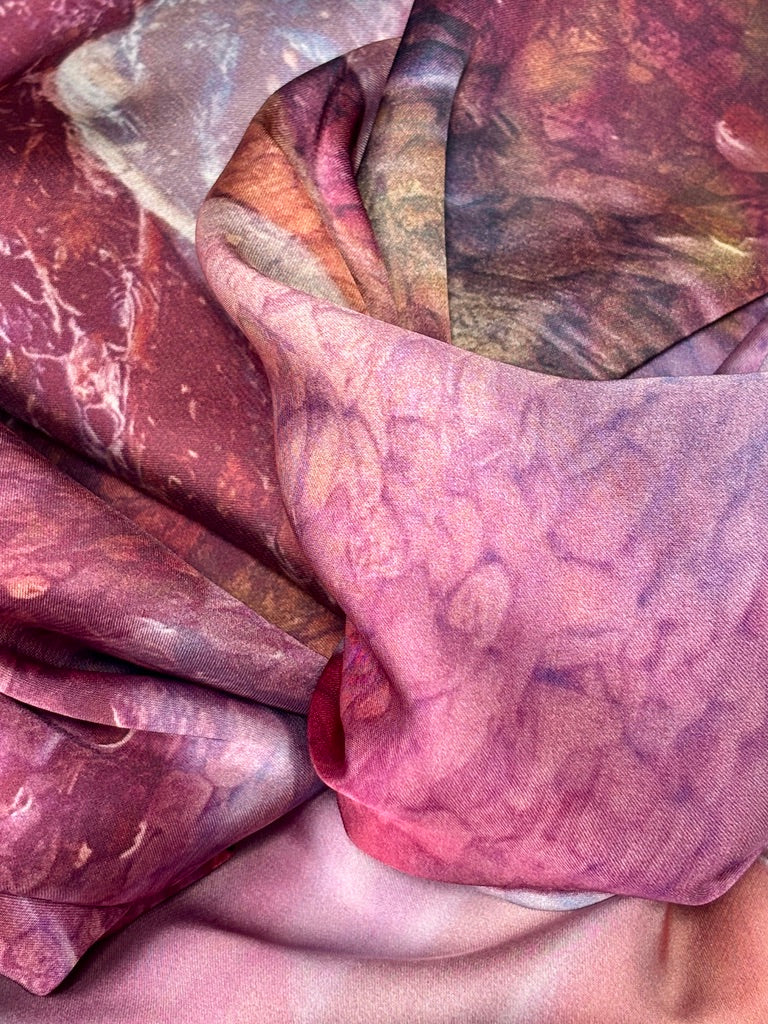 Close up of casually placed Satin Scarf Peony. Showing patterned pink fabric.