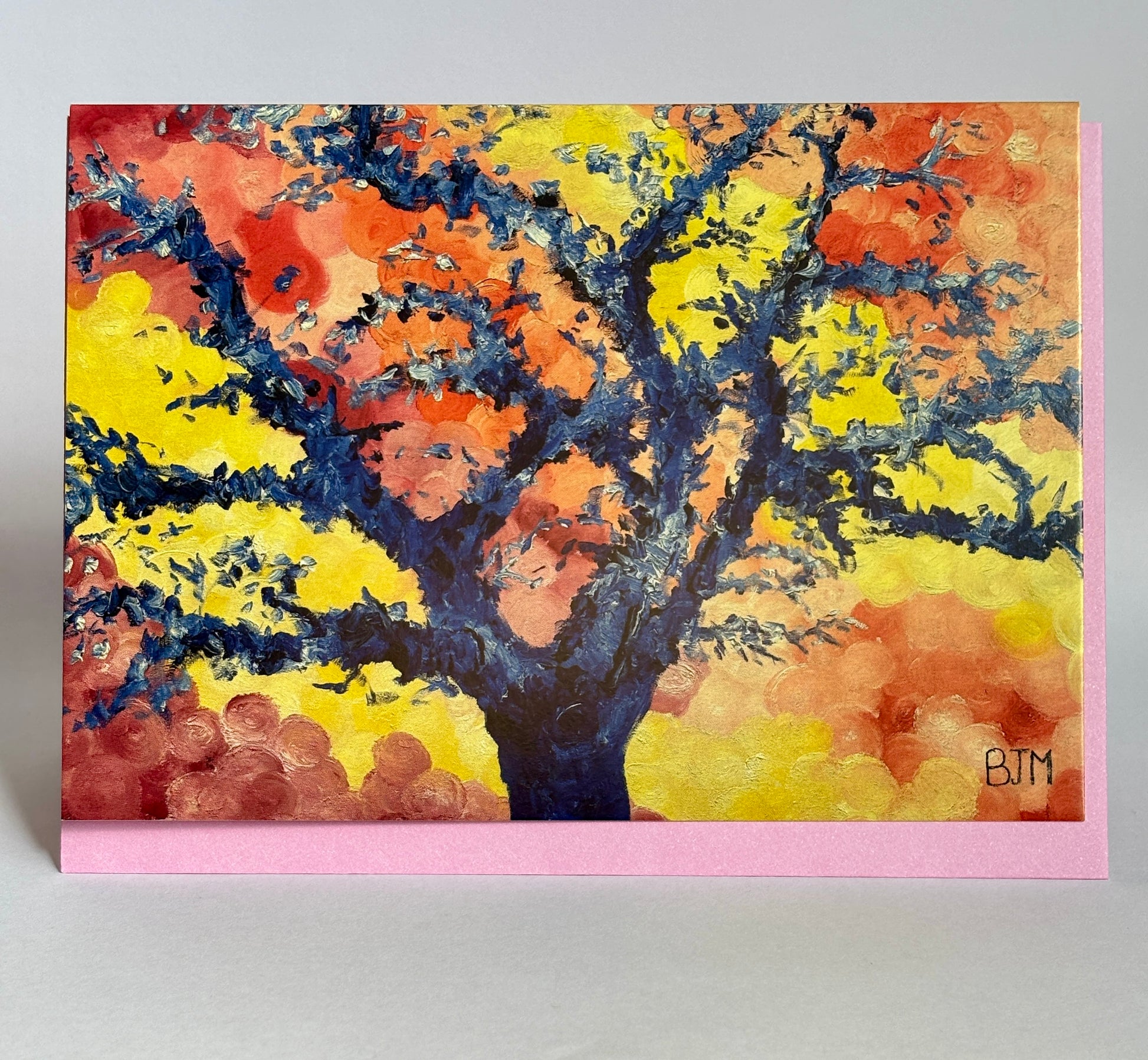 Colorful abstract painting of a tree with a pink border on a gray background